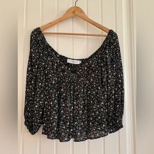 Boutique Top. Black with green floral detail